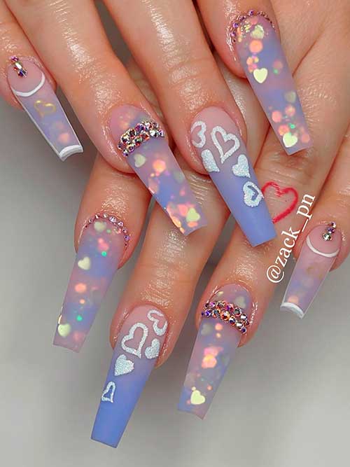 Long coffin matte purple ombre valentine's day nails with confetti glitter, rhinestones, and white heart shapes