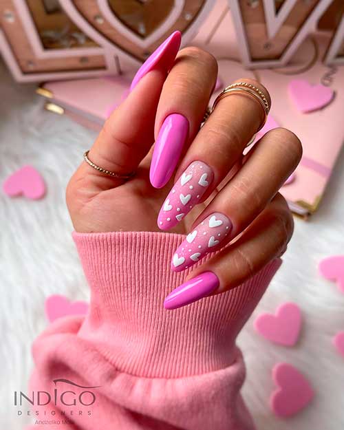 Long pink valentine’s nails 2023 with white hearts on two pink ombre accent nails