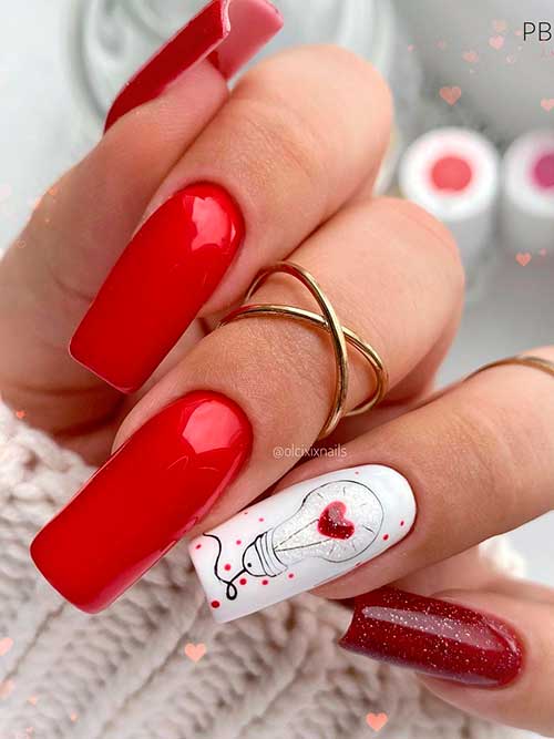 Long square glossy red valentines day nails 2022 with white and shimmer dark red accents Long square glossy red valentines day nails 2022 with white and shimmer dark red accents