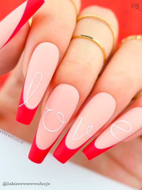 Matte French red valentines day nails 2022 with white letters of LOVE word design Matte French red valentines day nails 2022 with white letters of LOVE word design