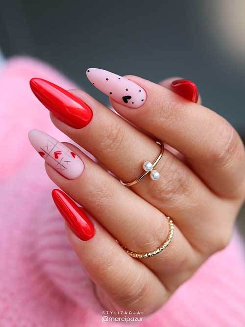 Pink and red valentine's day nails almond shaped with black dots and heart shapes