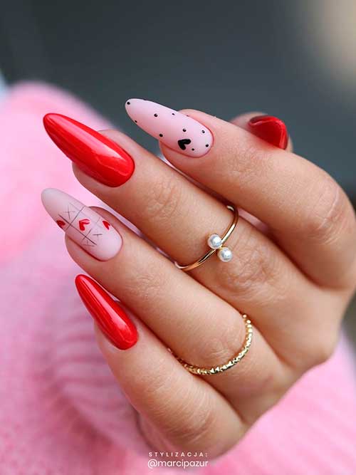 Pink and red valentines day nails almond shaped with black dots and heart shapes Pink and red valentine's day nails almond shaped with black dots and heart shapes