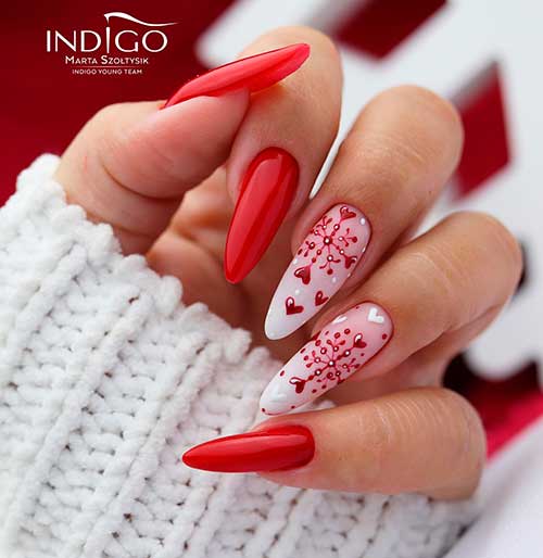 Long Almond Shaped Red Valentines Day Nails 2022 with Red Snowflake Accents with Hearts