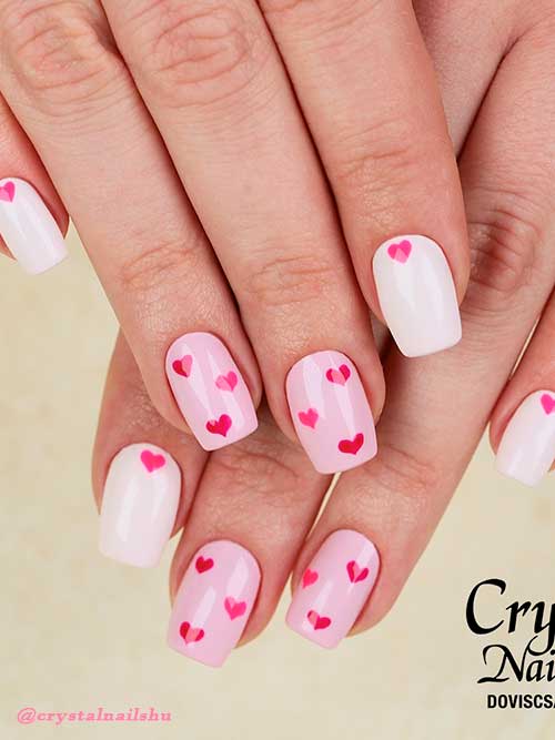 Short square white and pink valentines day nails with hot pink heart shapes design Short square white and pink valentines day nails with hot pink heart shapes design