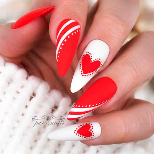 Stunning Almond Matte Bright Red Valentines Day Nails 2022 with Red Hearts on Two White Accents
