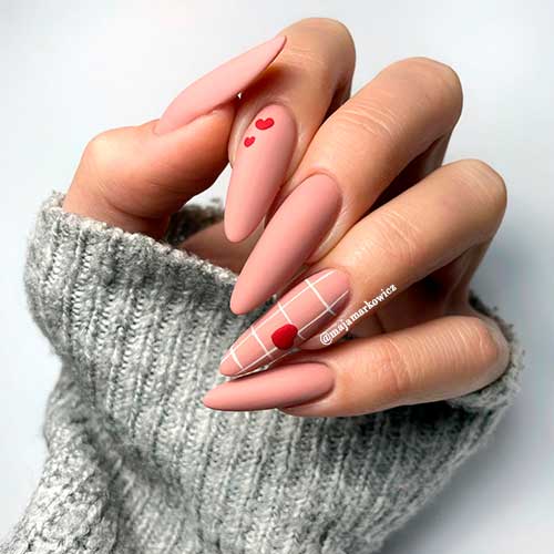 Long Valentines Nude Almond Nails with Red Hearts and White Checkered Accent Nail