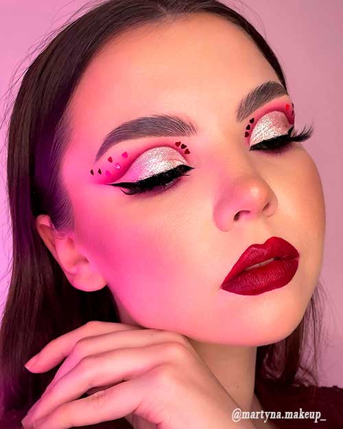 Bold Valentines Day Makeup Look Consists of Dark red Lips, Pink and Gold Eyeshadow Eye Look