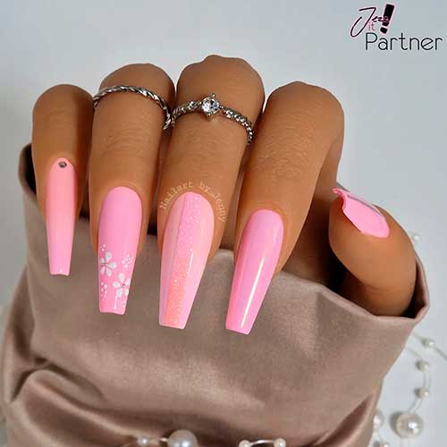 Long Coffin Candy Pink and Pastel Coral Spring Ombre Nails with White Blossoms and Glitter on Two Accents