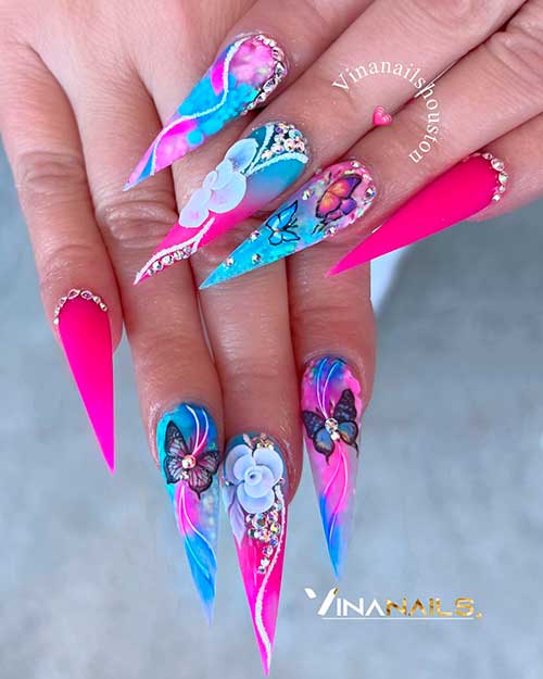 Colorful Stiletto Spring Nails Colorful Stiletto Spring Nails with Butterflies, White Flowers, and Rhinestones