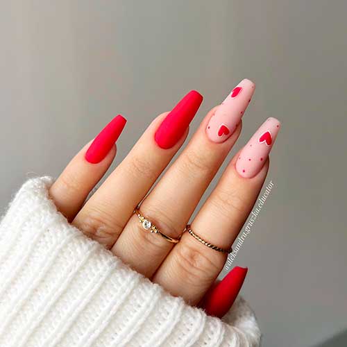 matte red valentine’s coffin nails Long matte red valentine’s coffin nails 2023 with red hearts and dots on nude pink accent nails
