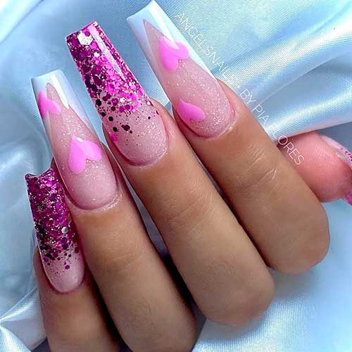 Long sparkling Valentine’s coffin nails 2023 with glitter, white French tips, and pink hearts