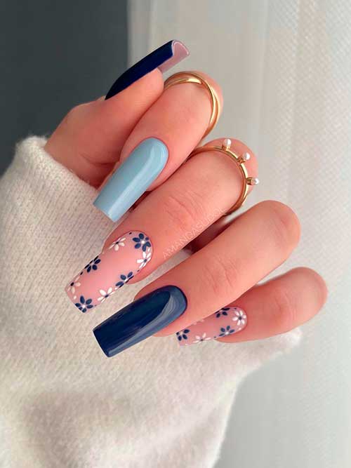 Long square shaped Navy Blue with Two Accents Flower Nails and Accent Light Blue Nail Design for Spring Time