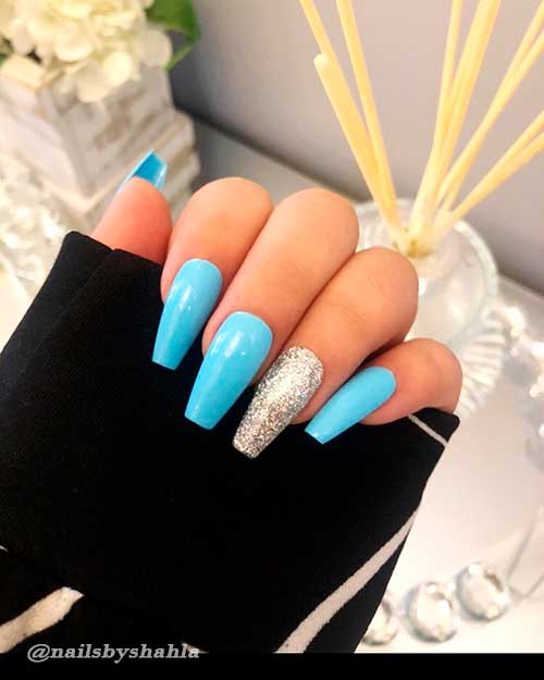 Medium Length Glossy Light Blue Coffin Nails with Accent Silver Glitter Nail