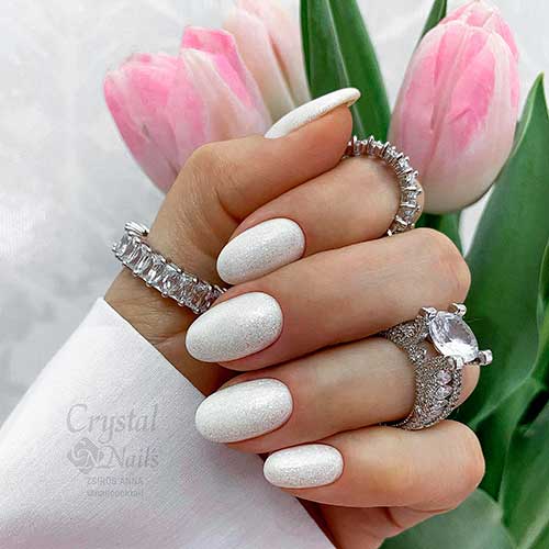Medium Round White Nails with Solid Glitter for Spring Time