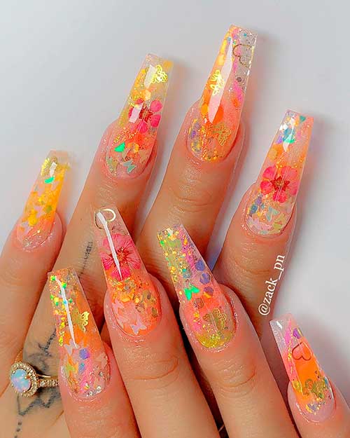 Encapsulated Long Coffin Glitter and Flower Nails Design Encapsulated Long Coffin Glitter and Flower Nails Design over Clear Acrylics
