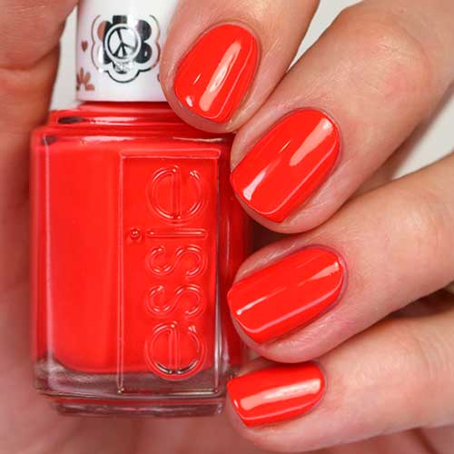 strawberry short red nails use Keys To Happiness Essie Nail Polish from the Essie Movin’ & Groovin’ Collection