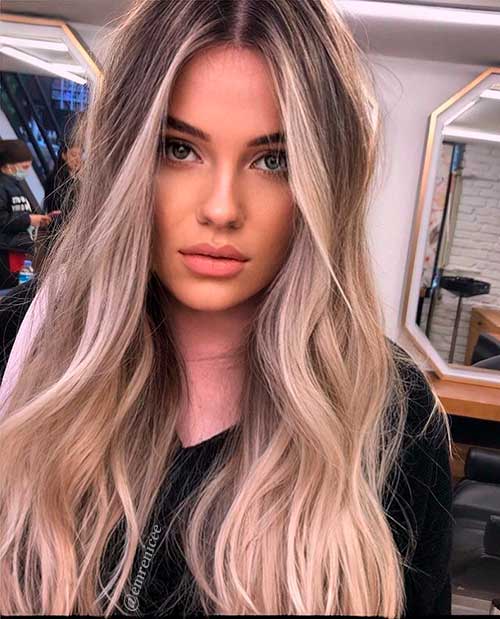 Gorgeous long Hair Dyed with Beach Blonde Hair which is one of the Stunning Spring Hair Colors to Try