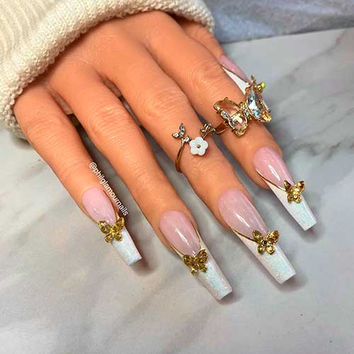 Long coffin shimmer white French tip nails with 4d gold butterflies for spring and summer 2022 seasons