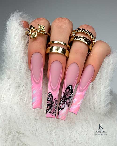 Long square shaped matte pink French tip nails with white marble effects and black butterflies on two accents