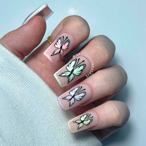 Matte multicolored butterfly nails on medium coffin shaped design for spring and summer 2022