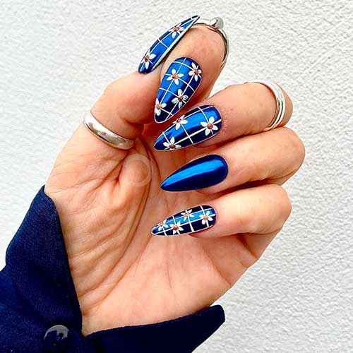 Metallic Blue Chrome Nails with White Flowers Long Almond Metallic Blue Chrome Nails with White Flowers