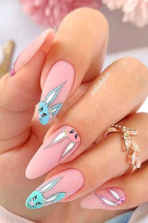 Multicolored Easter Bunny Nail Art Design Over a Nude Pink Base with Tiny White Dots