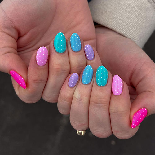 Short Multicolored Easter Nails adorned with white polka dots