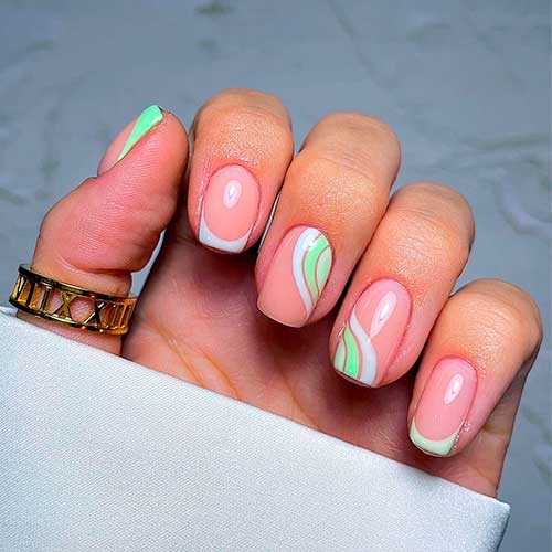 Short Pastel Green and Blue French Spring Nails 2023 with Swirls on Two Accent Nails