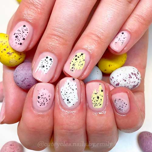 Short Simple Easter Nails with Abstract Nail Art on Nude Nails
