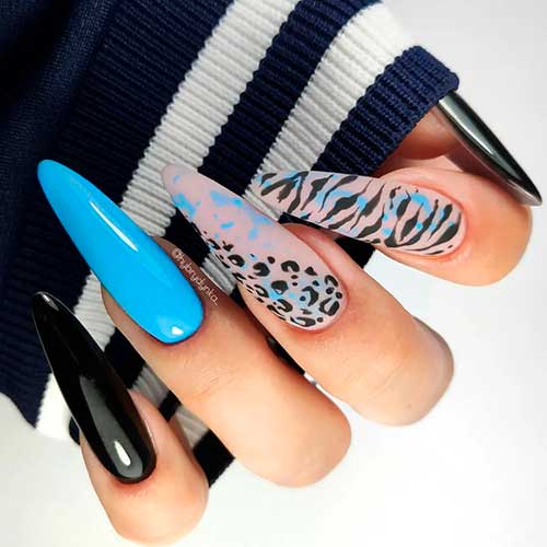 Blue and Black Wild Nail Art Design Long Almond Blue and Black Wild Nail Art Design with Leopard and Zebra Prints on Nude Accents for Summer 2022