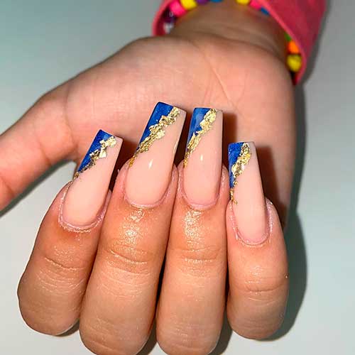Blue and Gold Foil Graduation Manicure Long Blue and Gold Foil Graduation Manicure over Nude Base Color