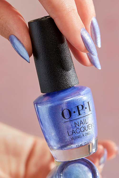 Long pearlescent light blue nails use OPI nail polish You Had Me at Halo from OPI Xbox Spring Nail Colors