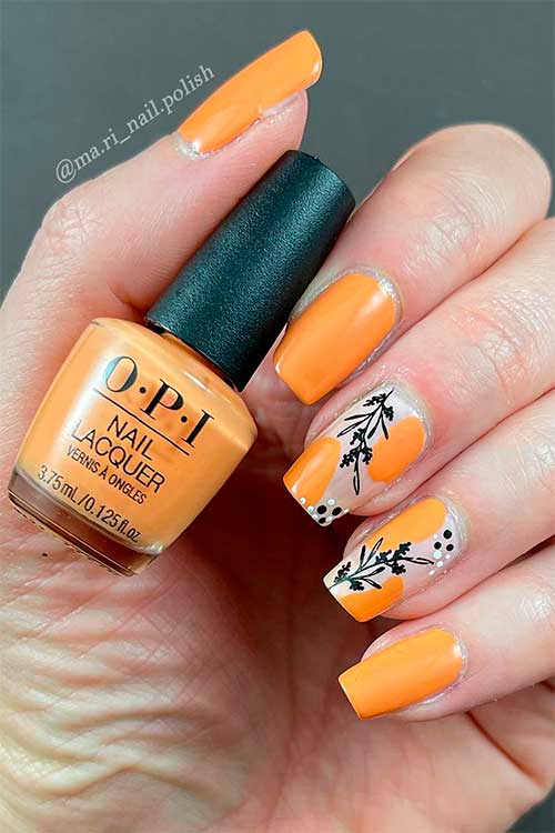 Medium coffin shaped orange nails use Trading Paint from OPI Xbox spring nail colors 2022 Collection Medium coffin shaped orange nails with leaf nail art use Trading Paint from OPI Xbox spring nail colors 2022 Collection