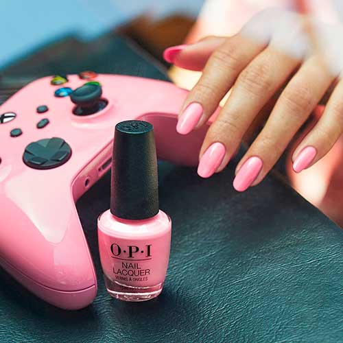 Medium round shaped dusty rose nails use OPI Nail Polish Racing for Pinks from Xbox Collection