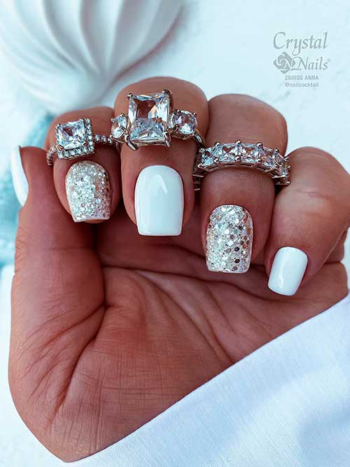 Square Shaped Short White Nails with Silver Glitter Two Accent Nails and Silver Rings for Summer 2022