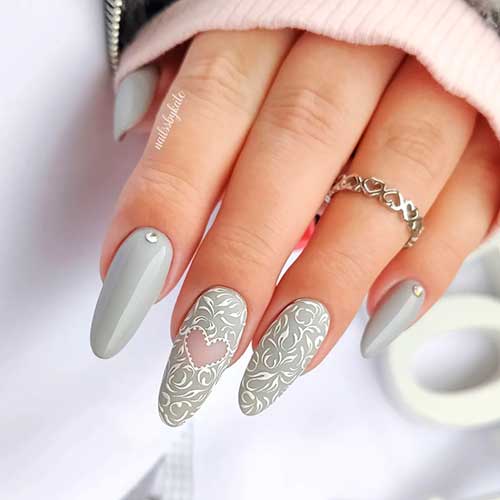 Long Valentine's Day Grey Nails with Rhinestones and A Heart Shape on Accent Nail