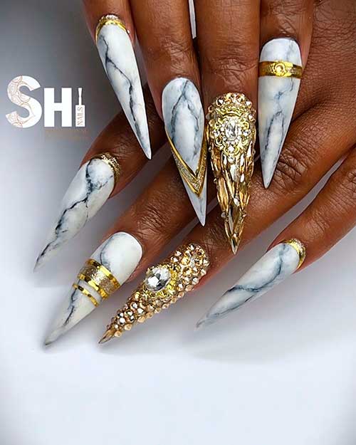 Long Stiletto White Marble Nails with Gold and Bling Accent