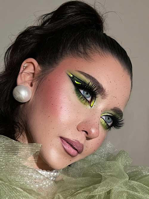 Bright summer makeup with neon yellow eyeshadow, defined lashes, glowing skin, and polished nude lips for a fresh, radiant look. Bright summer makeup with neon yellow eyeshadow, defined lashes, glowing skin, and polished nude lips for a fresh, radiant look.