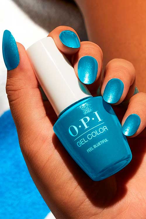 OPI Nail Polish Feel Bluetiful Medium round turquoise nails Using OPI Nail Polish Feel Bluetiful from OPI Power of Hue Summer 2022 Collection