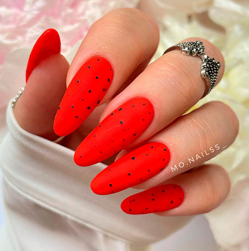 Long Almond Matte Red Neon Nails with Black Speckles for Summer 2022
