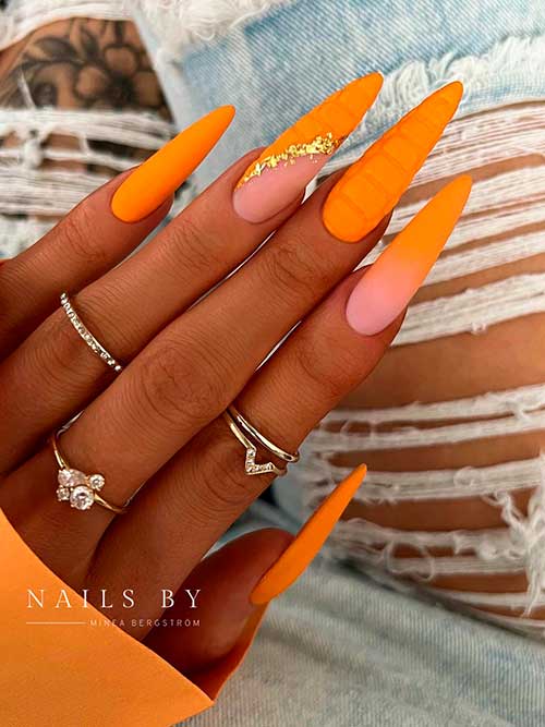 Long Stiletto Summer Neon Orange Nails with Two Crocodile Nails Adorned with Gold Glitter