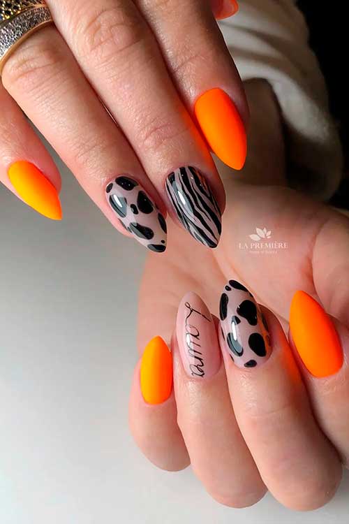 Short Stiletto Neon Orange Nails with Two Animal Print Nails