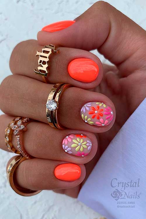 Short Neon Orange Nails with Flowers Short Neon Orange Nails with Colorful Flowers on Two Accents