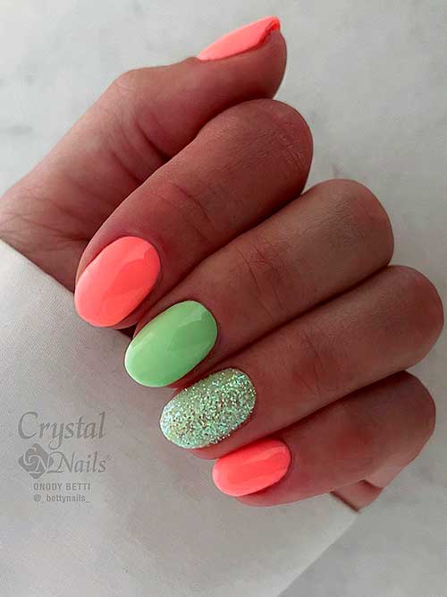 Short Round Summer Neon Orange and Green Nails with Glitter on Accent
