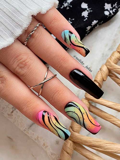 Long Coffin Shaped Black Swirl Nails on Colorful Ombre Nails with Black Speckles and Two Accent Black Nails