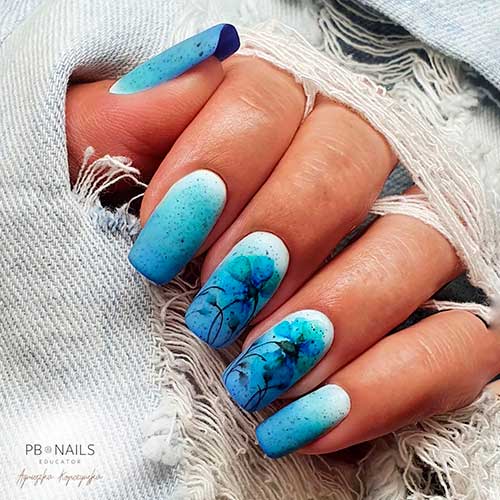 Medium Square Shaped Blue and White Ombre Nails with Flowers and Black Speckles