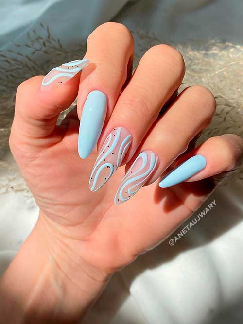Long Almond Light Blue Swirl Nails with Two Light Blue Nails for Summer 2022