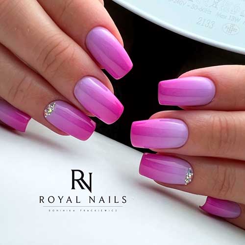 Light to Dark Purple Ombre Nails with Rhinestones on Ring Fingernail for Summer 2022