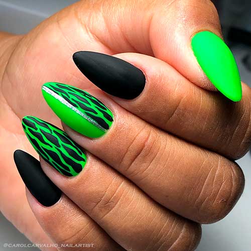Medium Almond Neon Green Nails With Black Accents and Black Zebra Prints Adorned with Silver Line Glitter