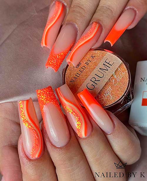 Long Coffin Shaped Orange Swirl Nails Design with Gold Glitter on Nude Base Color for Summertime